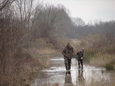 Granddad and grandson hunting